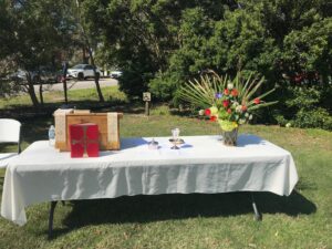 Outdoor Altar setting with bible and flowers at St Thomas Episcopal Church Bath NC
